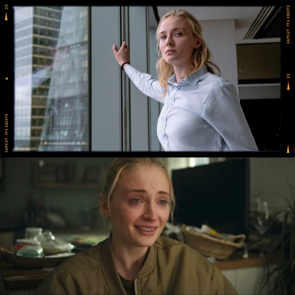 A young woman in a blue shirt stands against a large window, looking thoughtfully outside, with skyscrapers reflected in the glass.